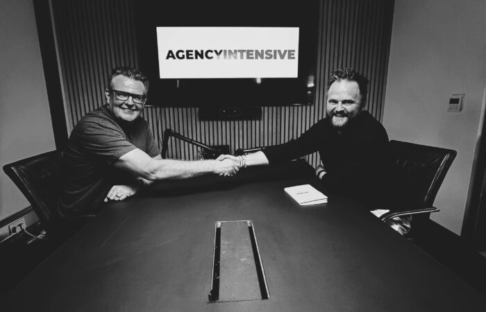 mikey and richard hand shaking